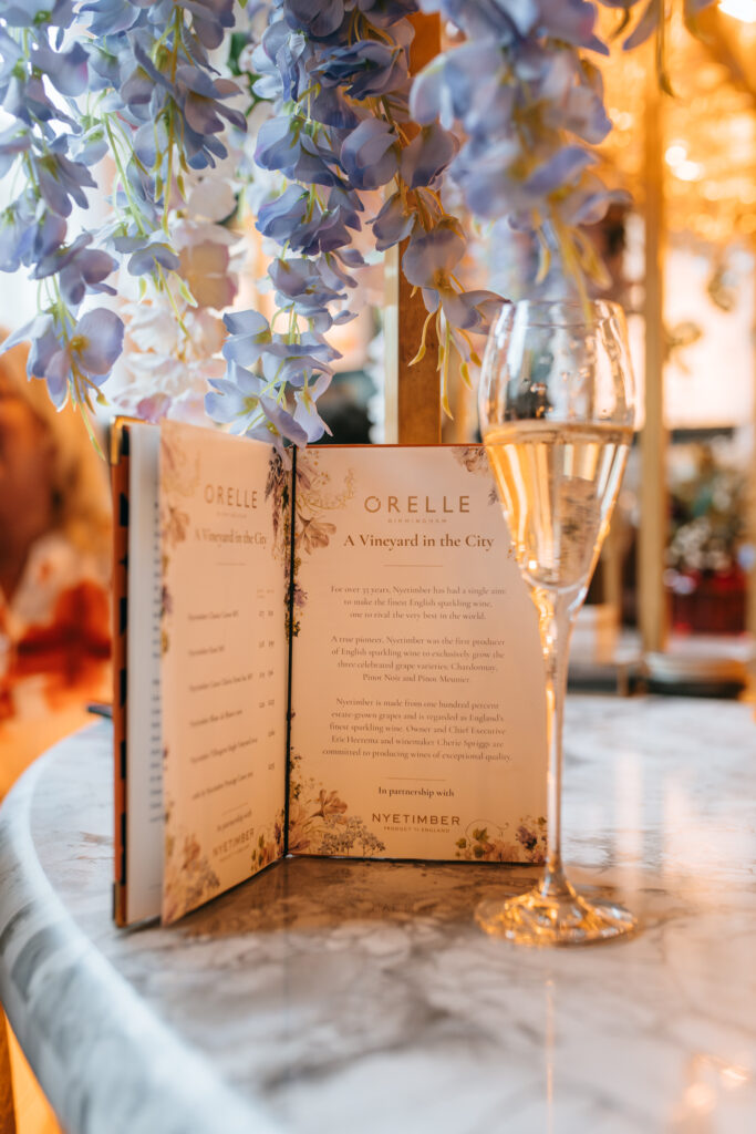 250515 @DAISYDENHAM ORELLE NYETIMBER 8758 Enhanced NR Summer has arrived at Orelle as the terrace and cafe transforms into 'The Vineyard'.
